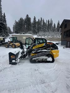 Our snow property management service ensures your home is safe and accessible all winter by efficiently clearing driveways with reliable care. for R&H Homes in Bozeman, MT