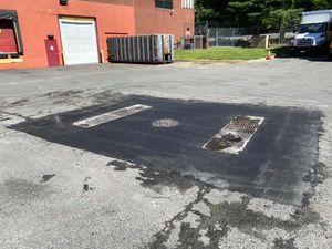 Our Patching service efficiently repairs cracks and potholes in your driveway or pavement, ensuring a smooth surface. Trust our expert team to restore durability and extend the lifespan of your asphalt. for Payne's Pavement Marking LLC in New Baltimore, VA
