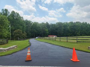 Our Driveway Repair service offers homeowners a convenient and efficient solution to fix any damages or defects in their driveways, enhancing its overall appearance and functionality. for Johnson's Sealcoating & Painting in Inman, SC