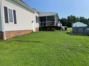 Enhance your lawn's health and beauty with our professional aeration service, which improves soil drainage, reduces compaction, and promotes robust grass growth for a lush, vibrant yard you'll love. for Lewis Oaks Landscaping in King and Queen County, VA