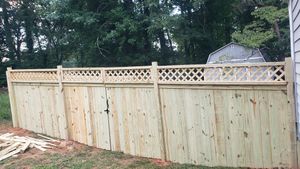 We provide professional fence installation services to help enhance your home's security, privacy, and aesthetic appeal. for Everest Fencing in Cartersville,  GA