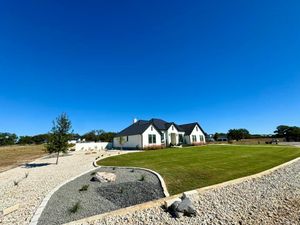 Our Fine Land Grading service ensures your lawn is perfectly leveled, enhancing drainage and promoting healthy grass growth, creating an ideal foundation for an efficient sprinkler system installation. for Bright Green Irrigation System in San Antonio, TX