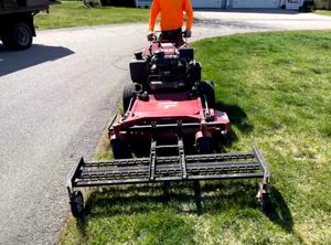 Our Lawn Aeration service helps to alleviate soil compaction and promote healthy root growth for a lush, green lawn. It is an essential component of any lawn care program. for RI Outdoor Living  in Charlestown, Rhode Island