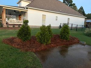 Our Mulch Installation service provides homeowners with professional and efficient assistance in placing a layer of mulch on their lawn, enhancing its appearance and improving soil health. for Childers Lawn Maintenance LLC  in Oxford,  MS