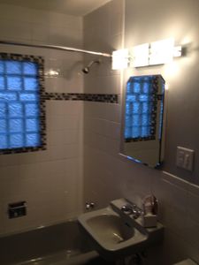 "Our Bathroom Renovation service offers homeowners a complete transformation of their outdated bathrooms, providing modern fixtures, stylish designs and skilled craftsmanship for a refreshing and functional space. for Midwest Remodel in Des Moines,  IA