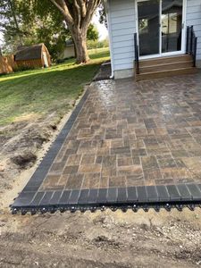Transform your outdoor space with our professional paver patio services, expertly designed for durability and aesthetic appeal, enhancing both functionality and value while perfectly complementing your home’s landscape. for Davis Landscaping in Wilson, WI