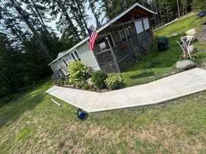 Transform your outdoor space with our professional Sidewalk Installation service. Our skilled team ensures durable, attractive, and safe walkways that enhance curb appeal while meeting all local regulations and safety standards. for Graham & Schriner Construction in Hinsdale, NH
