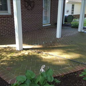 Our Driveway and Sidewalk Cleaning service ensures a deep clean, removing dirt, grime, and stains from your paths to enhance curb appeal and maintain a safe environment around your home. for First State Roof & Exterior Cleaning in Sussex County, DE