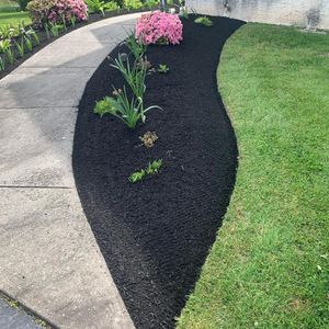 Our Mulch Installation service can help you keep your lawn looking great all year long! We can install mulch in a variety of colors to enhance your landscaping. for GM Landscaping  Construction LLC in Philadelphia, Pennsylvania