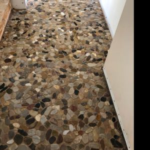 Our Tile service provides homeowners with professional installation and remodeling solutions, enhancing the aesthetics and functionality of their spaces through high-quality tile materials and expert craftsmanship. for Jose Tile Installation Services in Lawrence, MA