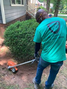 Our mowing service includes trimming around obstacles and edging along sidewalks and driveways. We will also blow off any debris from the lawn. for Mr Greens Landscaping in Chesterfield, VA