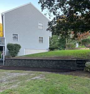 Our Retaining Wall Construction service enhances landscape stability while adding elegance and functionality, expertly designed to prevent erosion and create visually appealing terraces for improved outdoor living spaces. for Rose Landscape & Design, Inc. in Abington, MA