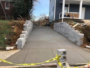 Our Retaining Wall Construction service provides durable and aesthetically pleasing solutions, enhancing your landscape's functionality and appeal. Trust our skilled team for quality craftsmanship that supports and beautifies your outdoor spaces. for Davey's Masonry & Concrete LLC in Baltimore, Maryland