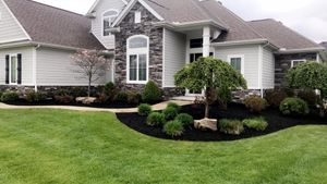 Mulch is used to help maintain the health of your landscape and adds a professional touch to any planter. It can be placed over soil to lock in moisture and improve soil conditions to encourage a healthier lawn. We provide a variety of professional mulching services. for Reliable Landscape in Monclova, Ohio