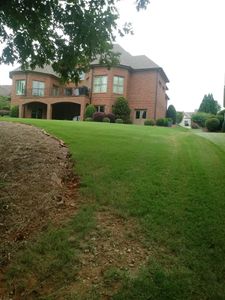 Our lawn care service includes weekly mowing, edging, and blowing of clippings. We also offer seasonal fertilization and weed control services. for Grass Monkey in Gainesville, GA