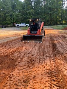 Our grading service offers homeowners accurate and reliable assessment of their property's condition, ensuring proper land leveling and drainage for optimal functionality. for Southern Land Solutions Forestry Mulching, LLC in Cleveland, NC