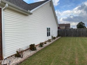Our Home Softwashing service is a safe and effective way to clean the exterior of your home. We use a low-pressure system and special detergents to remove dirt, mildew, and algae from your home's siding, windows, gutters, and roof. for Sexton Lawn Care in Jefferson, GA