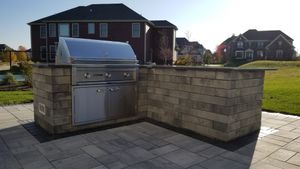 We specialize in designing and building custom outdoor kitchens, transforming your backyard into a beautiful entertaining space. for Daybreaker Landscapes in McHenry County, Illinois