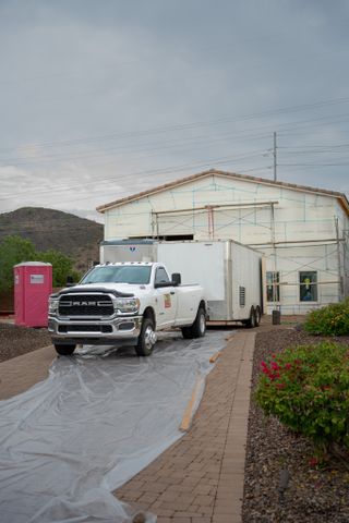 Foam Pro pickup and spray rig trailer parked at a Valley job site
