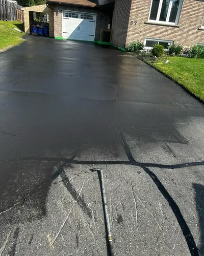 Asphalt crack filling and repair on a Sudbury surface
