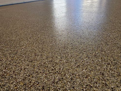 Ployaspartic Chip Coating for Majestic Concrete and Landscape in Cross Lake, MN