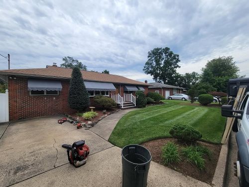 Mowing for Stars and Stripes Landscape Design LLC in Edison, NJ