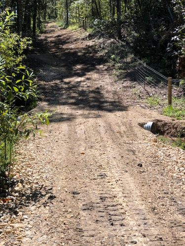 Driveway Design & Build for Between The Hedges Landscape & Trucking LLC in Altha, FL