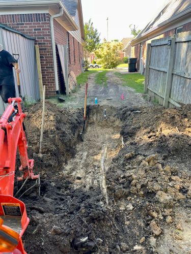 Scnider Drainage & Landscape  for Emory's Garden Landscape Emporium in Memphis,  TN