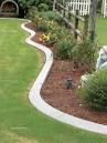 Continuous Concrete Landscape Curbing for Broker Post Ground Crew in Sussex County, DE