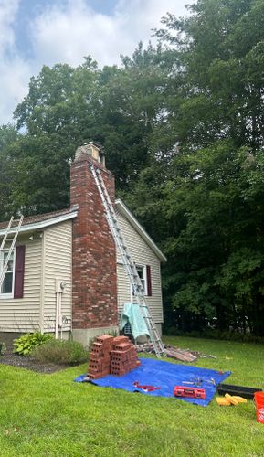 Chimney Rebuild for Boston Elite Roofing & Masonry in Somerville,  MA