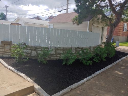 Mulch Installation for VQ Land & Stone in St. Louis, MO