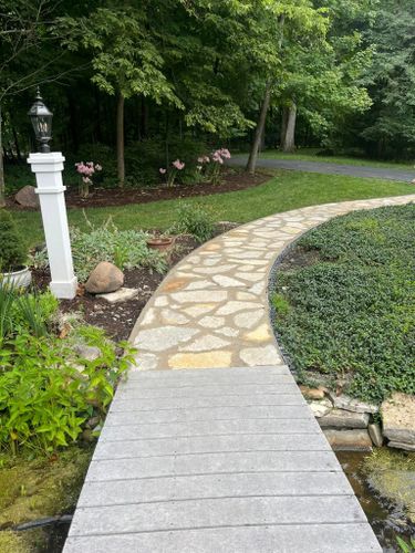 Flagstone Walkway Installation for Higgins landscaping LLC in West Jefferson, OH