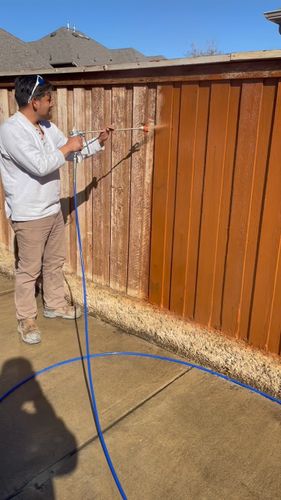 Fence Staining for Magnolia Landscape & Design in Aledo, TX