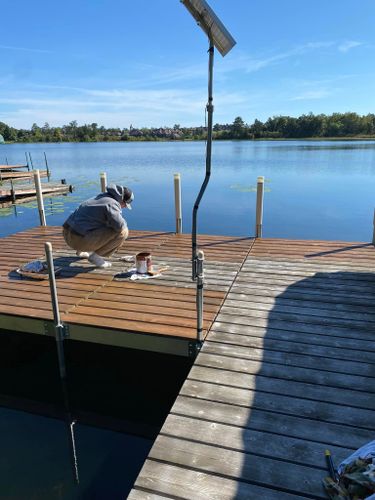 Dock & Deck Staining for JT’s Underwater Landscaping in Brainerd, MN