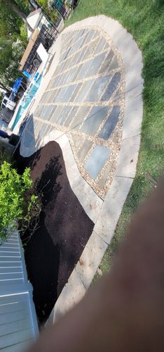 Mulch Installation for VQ Land & Stone in St. Louis, MO