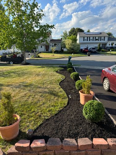 Mulch Installation for Stars and Stripes Landscape Design LLC in Edison, NJ