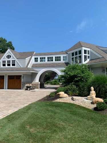 Driveway and Sidewalk Cleaning for Unlimited Softwash in Bellingham, MA