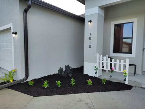 Mulch and rocks installation for BH Lawn and Landscape in Fort Myers, FL