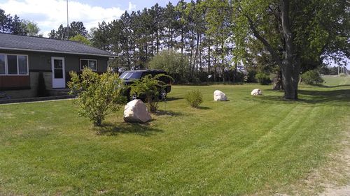 Shrub Trimming for LLS Property Solutions in Big Rapids, MI