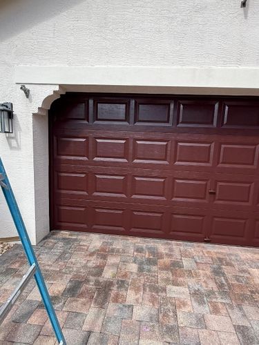 Garage Door Spraying & Re-painting for Zero Pressure Roof Cleaning INC in West Palm Beach, FL
