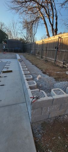 Retaining Wall Installation for DeLoera Total Lawncare in Oklahoma City, Oklahoma