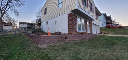 Retaining Wall Construction for VQ Land & Stone in St. Louis, MO