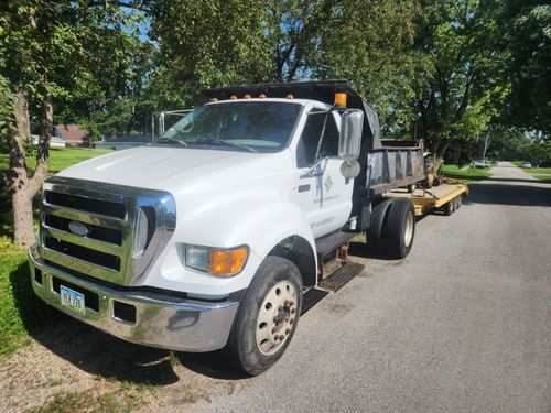 Small Load Dump Truck Services for Precision Excavating and Septic in Madrid, IA