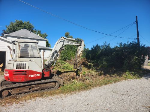 Debris Removal for Precision Excavating and Septic in Madrid, IA