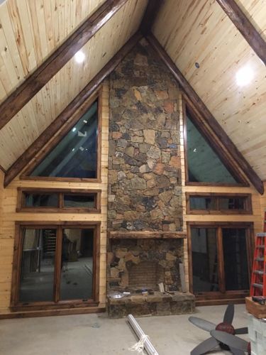 Log Home Finishing for Moss Construction in Longview, TX