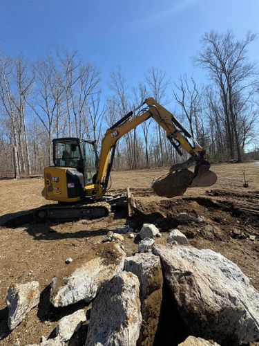 Residential Excavation for Chapman's Lawn & Landscape in Ellington, CT