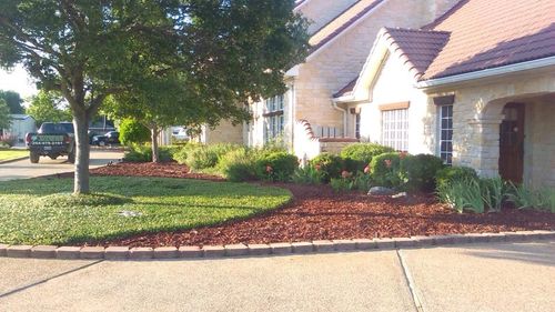 Mulch Installation for Superior Lawn and Tree LLC in Clifton, TX