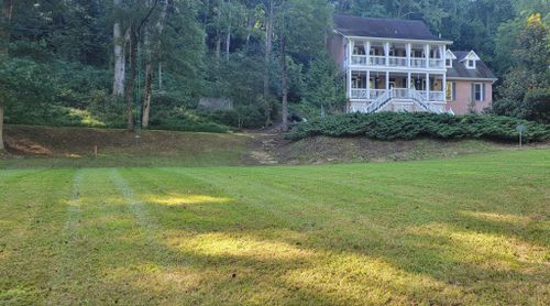 Mowing for Hart and Sons in Transylvania County, North Carolina