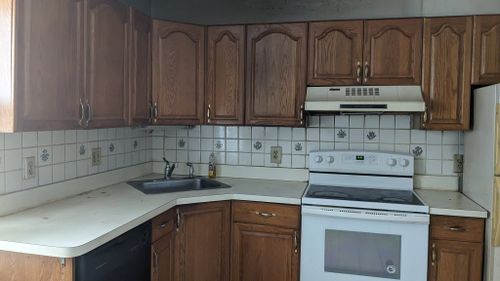 Cabinet Refinishing for William McKay Construction Management in North Andover, MA