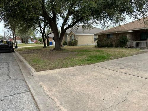 Mowing for Allen Lawn Care in Taylor, Texas